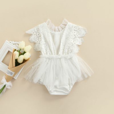 Delicate white baby dress with lace details and tulle skirt, perfect for special occasions, christenings, or photo shoots, available at Monalisa Store for stylish infants.