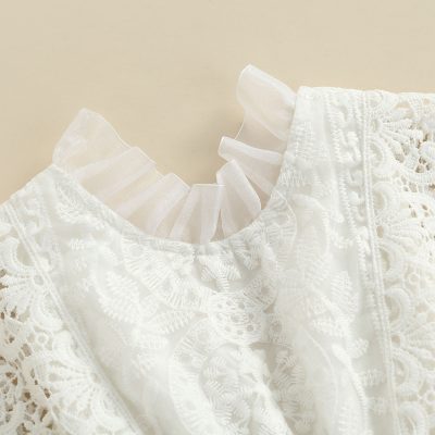 Luxury white lace blouse with ruffled neckline, intricate embroidery, and elegant design for women at Monalisa Store, perfect for stylish occasions and fashionable women seeking premium clothing options.