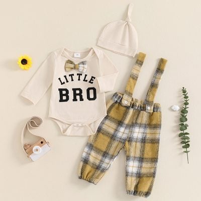 Soft baby clothing set with "Little Bro" bodysuit, plaid overalls, matching hat, and baby toy for newborns and infants.