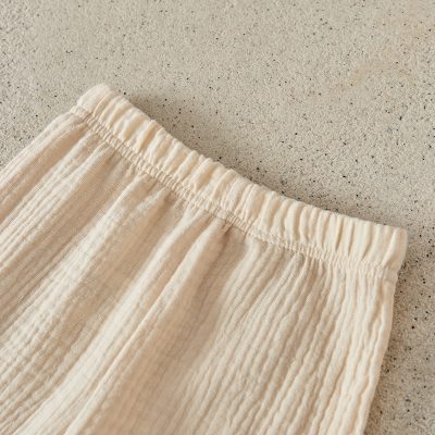 Soft beige linen comfortable lounge pants with elastic waistband for women - ideal for relaxing and casual wear. Perfect for everyday comfort and stylish loungewear.