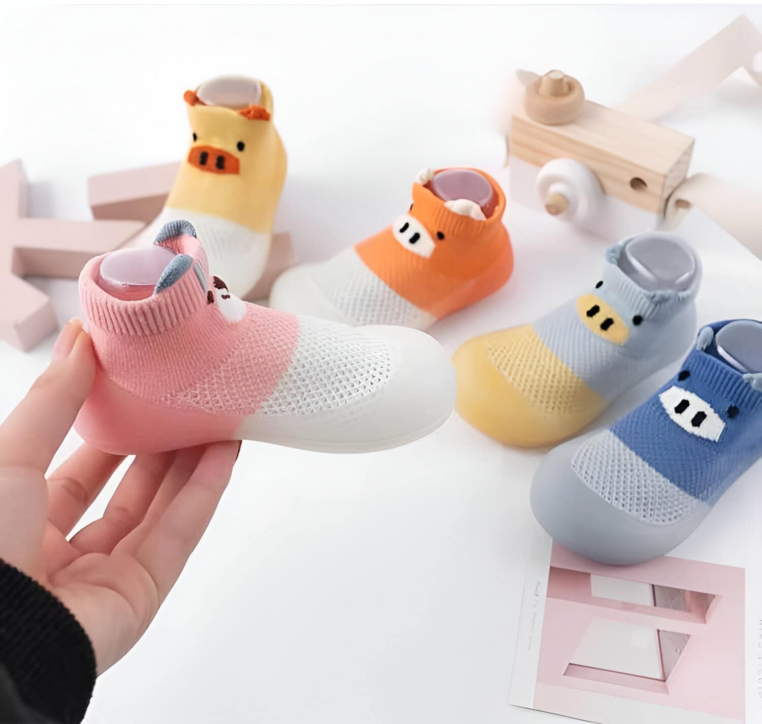 Colorful pig-themed designer sneakers with breathable mesh fabric for kids, featuring playful pig face embellishments, perfect for children's fashion and comfort.