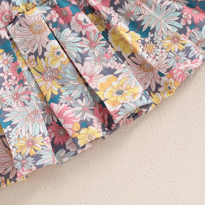 Floral fabric, colorful floral print on cotton, perfect for fashion, sewing, or home decor projects, bright and vibrant design for stylish accessories or garment making.