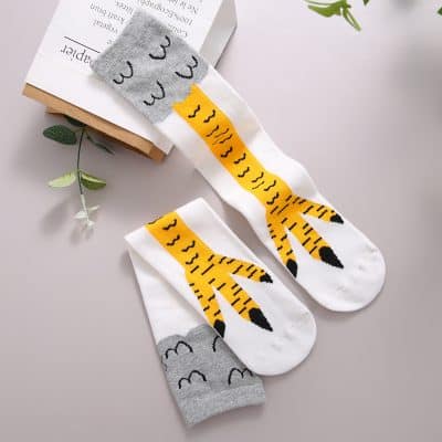 Colorful tiger and cloud pattern socks for kids, fun and comfortable footwear. Perfect for playful children, featuring soft fabric and vibrant design, ideal for casual wear and boosting kids' style at Monalisa Store.
