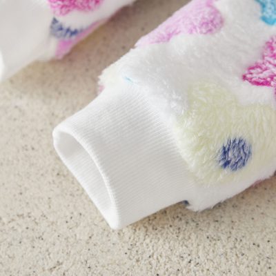 Soft, plush fleece fabric with colorful floral print, perfect for cozy loungewear or casual wear, ideal for brightening up your wardrobe, available at Monalisa Store.