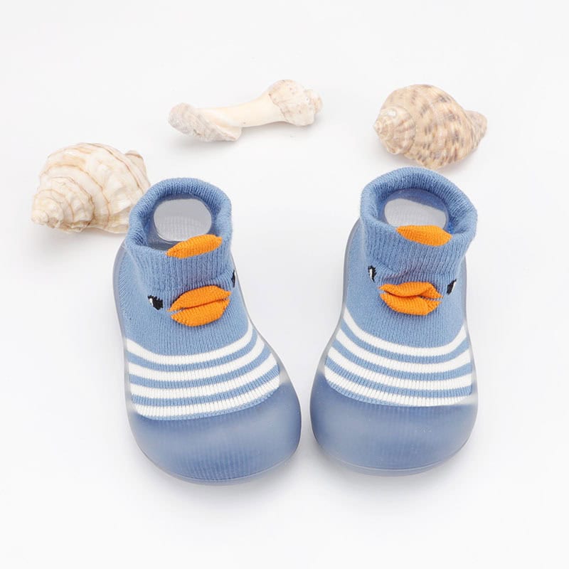 Cute baby shoes with a duck face design, striped socks, and soft soles, perfect for infants and toddlers. Stylish, comfortable, and ideal for summer outings and casual wear.