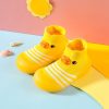 Bright yellow duck-themed baby slippers with sock design, soft and comfortable for infants, featuring cute duck faces, suitable for cozy household wearing.