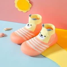 Cute children's slippers with bear face design, soft sock-like upper, and colorful striped pattern, perfect for cozy indoor wear and playful kids' footwear at Monalisa Store.