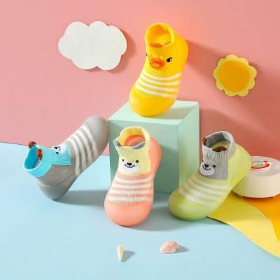 Fluffy animal-themed children's socks featuring cute bear, dog, and chick designs in pastel colors, suitable for playful and comfortable kids' footwear at Monalisa Store.
