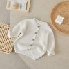 Knitted white baby cardigan, cozy infant clothing, Monalisa Store organic baby fashion, soft cotton newborn sweater for boys and girls, stylish babywear for winter and spring seasons, premium quality baby knitwear.