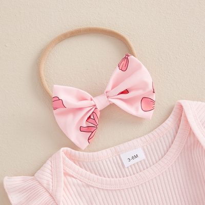 Pink baby headband with bow for infant girls, perfect accessory for baby girls' fashion and photo shoots.