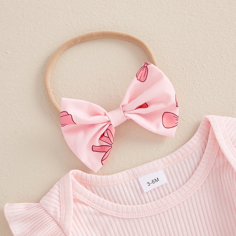 Pink baby headband with bow for infant girls, perfect accessory for baby girls' fashion and photo shoots.