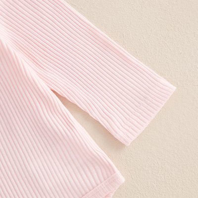 Pink ribbed long sleeve top for women, perfect for casual and stylish everyday wear. Designed with comfortable and breathable fabric, ideal for all seasons.