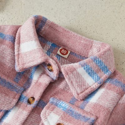 Pink plaid wool coat with button details and size tag 80, perfect for stylish winter wear.