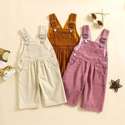 Soft pastel and earth-tone corduroy overalls for kids, perfect for stylish comfort and casual wear. Featuring adjustable straps and spacious pockets, ideal for everyday adventures.