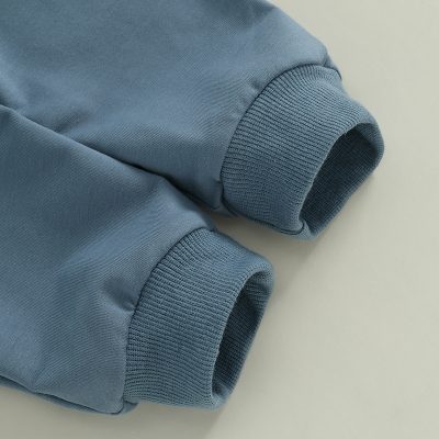 Comfortable blue sweatshirt cuffs, perfect for cozy fashion or sportswear, designed for a relaxed fit and durability.