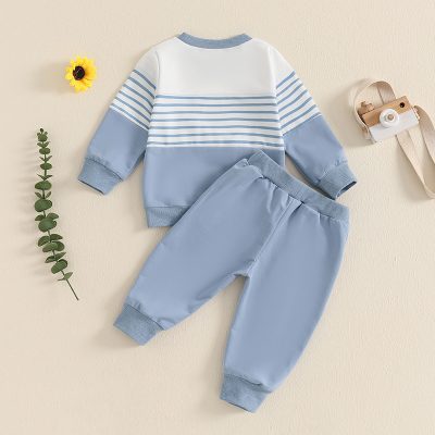 Boy's pastel blue and white striped sweatshirt and matching jogger pants set, perfect for casual wear and active play, made with soft, comfortable fabric.