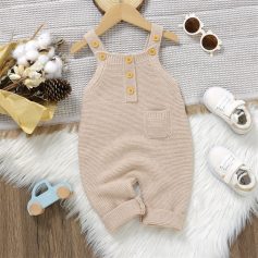 Soft beige baby romper with button details, shoulder straps, and front pocket, perfect for infant fashion and comfortable wear from Monalisa Medical Store.