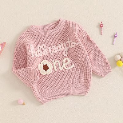 Pink children's knit sweater with playful "little lipstick" and "one" embroidery, adorable and cozy, perfect for kids' fashion and casual wear.