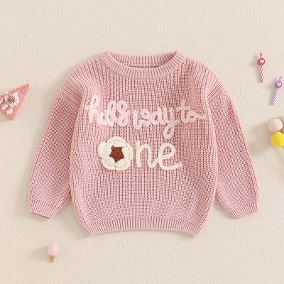 Soft pink knitted sweater with embroidered