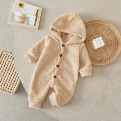 Soft beige baby fleece jumpsuit with hood and button closure, perfect for newborns and infants, ideal for cozy winter or fall wear.