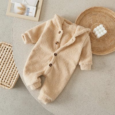 Soft baby teddy fleece jumpsuit in cozy beige, perfect for infants’ comfort and warmth. Ideal for stylish baby wear from Monalisa Store, featuring easy button closure and plush fabric.