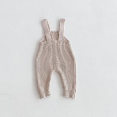 Soft beige baby knitted overalls with shoulder straps, perfect for infant wear and comfort. Stylish and cozy clothing for newborns and toddlers. Ideal for casual and everyday baby outfits.