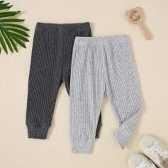 Comfy ribbed knit baby leggings in gray and black, perfect for kids’ casual wear and outdoor activities.