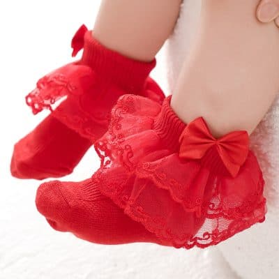 Red baby socks with lace and bow decoration, adorable infant footwear, Monalisa Medical Store opt product.