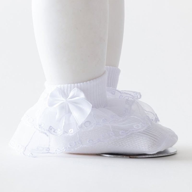 Ribbon baby shoe with lace and satin bow, white soft fashion footwear for infants, adorable and comfortable baby dress shoe, delicate lace detail for special occasions.
