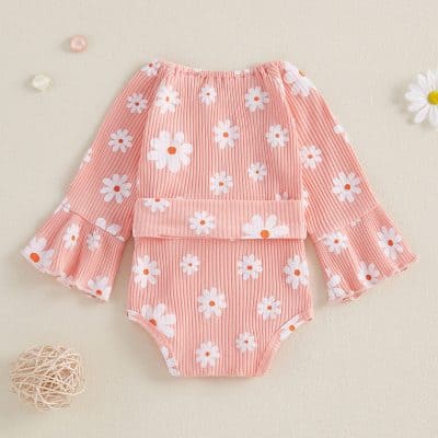 Pink daisy print kids' bathing suit with ruffled sleeves and high waist, perfect for summer beachwear and swim activities. Soft, comfortable, and stylish for children.
