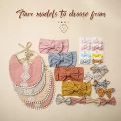 Pink and blue bow hair accessories displayed with matching bibs for babies at Monalisa Medical Store. Perfect for stylish infants and toddlers.