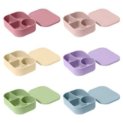 Pink, beige, purple, green, and blue silicone baby divided plates with lids ideal for feeding and child meal prep, featuring compartments for different foods on Monalisa Store website.