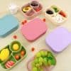 Colorful silicone snack containers with various fresh fruits and snacks, perfect for kids’ lunch boxes and meal prep. Bright, durable, and portable food storage solutions from Monalisa Store.