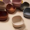 Colorful silicone bowls in various pastel shades, ideal for modern kitchen and dining accessories. Perfect for serving, storage, and stylish table presentation.
