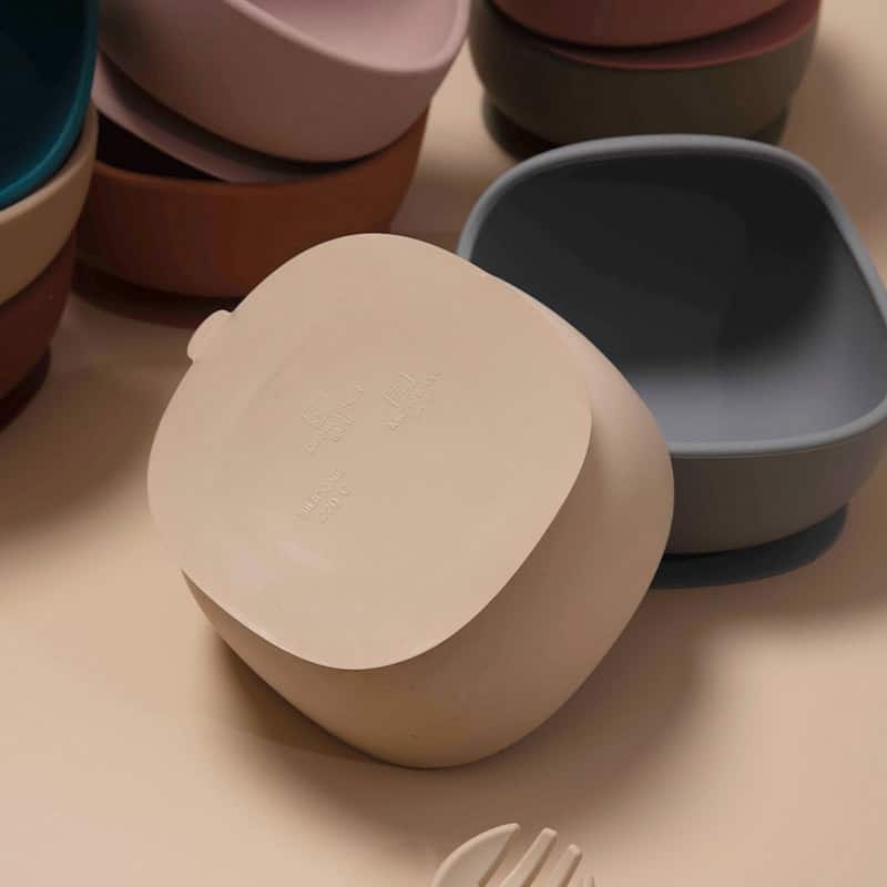 Cream-colored minimalist storage container with a smooth matte finish, suitable for home or office organization, available in various pastel shades.
