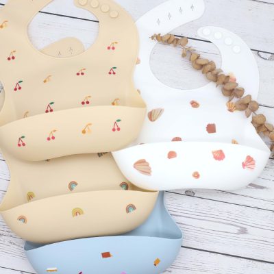 Cherry pattern silicone baby bibs, waterproof and easy to clean, perfect for feeding time. Durable and stylish baby accessories from Monalisa Store for infants and toddlers.