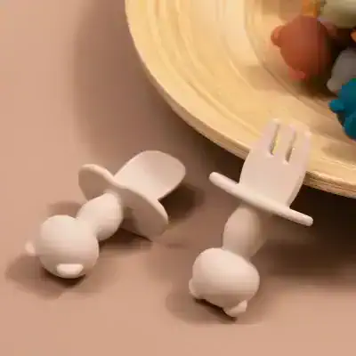 Bone-structured baby teething toys in neutral white, designed for infants to soothe gums, available at Monalisa Medical Store.