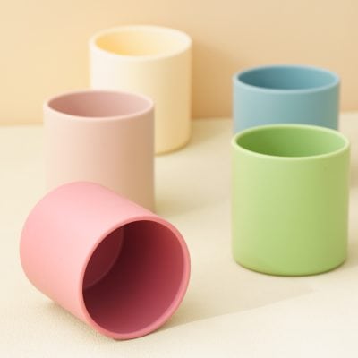 Bright pastel-colored silicone cups for medical and healthcare use, eco-friendly and fashionable storage options. Perfect for home, clinic, or spa settings.