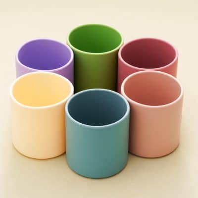 Colorful silicone cups for drinks and snacks, vibrant and reusable, ideal for everyday use, eco-friendly kitchen accessories, colorful tableware, modern design.