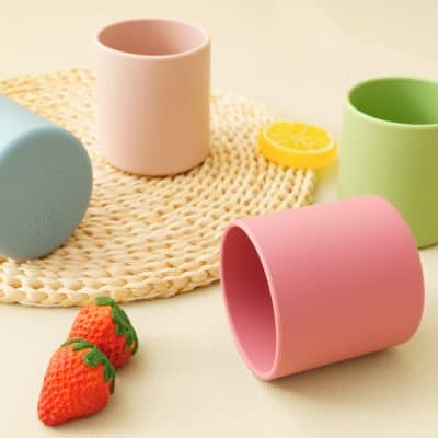 Colorful plastic cups in pastel shades, perfect for stylish home organization or kitchen use. Bright, modern design complements trendy, functional spaces.