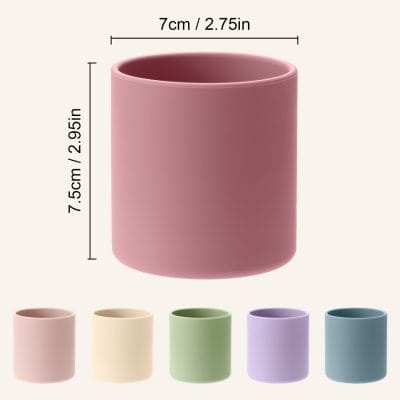 Pink ceramic storage cup with dimensions for vanity or office organization.