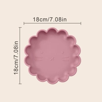 Pink flower-shaped silicone mold with measurements for baking or crafting purposes.