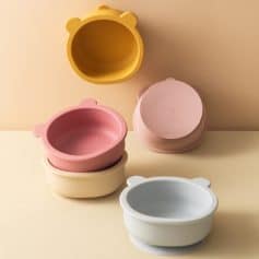 Colorful bear-shaped silicone storage containers in pastel pink, yellow, white, and gray, ideal for organizing small items or snacks, featuring a cute bear ear design at Monalisa Store.