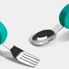 Spoon and fork with teal handles on a white background, emphasizing modern and stylish cutlery for eyewear packaging at Monalisa Store.