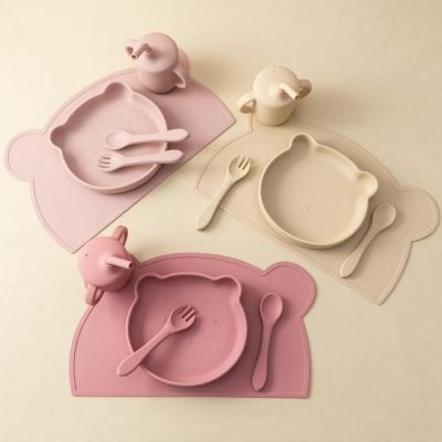 Cute bear-shaped silicone plate set for kids with matching spoon, fork, and teapot, ideal for mealtime, baby feeding, and nursery decor, non-toxic and easy to clean.