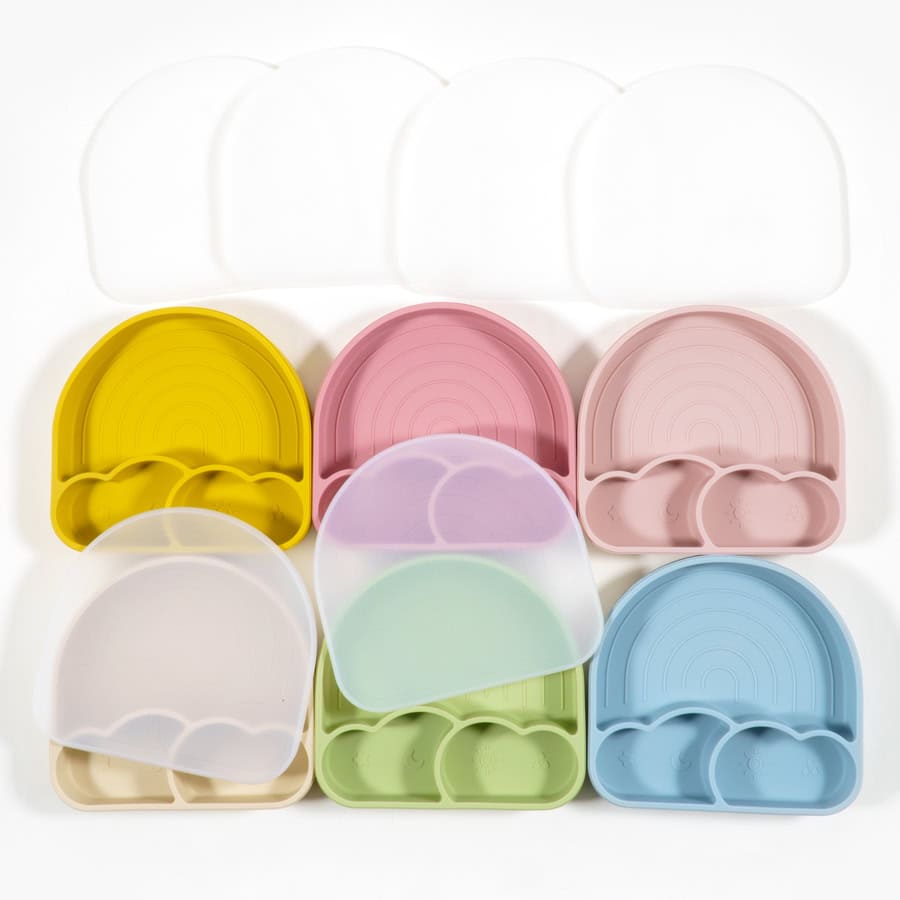 Colorful plastic divided plates with rainbow design, ideal for children’s meals, perfect for fun and functional dining experience.