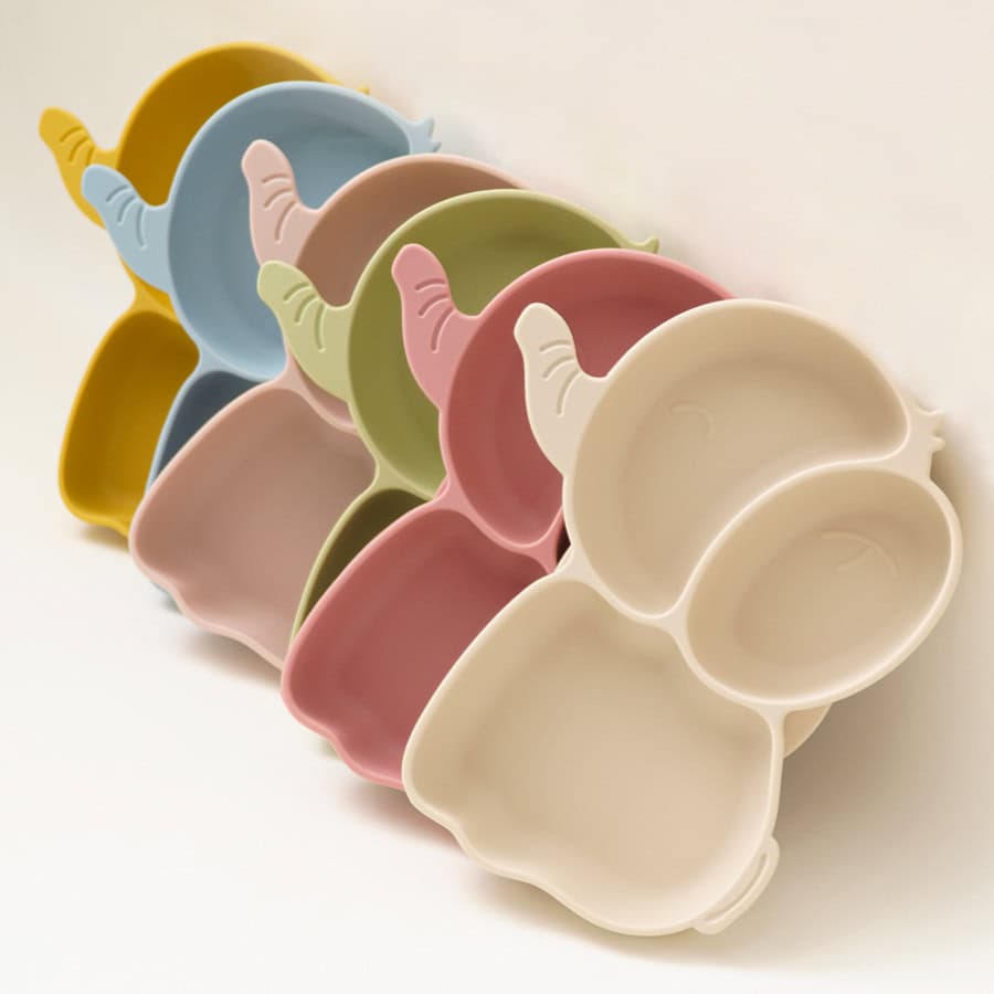 Colorful elephant-shaped ceramic plates for kids, perfect for mealtime; adorable and functional tableware from Monalisa Store.