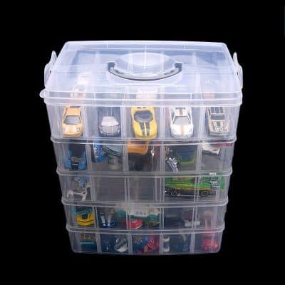 Clear plastic storage box with multi-level compartments for toy cars and collectibles, perfect for kids' room organization.