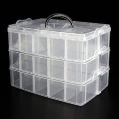 Clear plastic organizer box storage for contact lenses, eyeglasses, or optical accessories at Monalisa Store. Durable, portable container for easy organization of optical supplies.