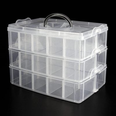 Clear plastic organizer box storage for contact lenses, eyeglasses, or optical accessories at Monalisa Store. Durable, portable container for easy organization of optical supplies.